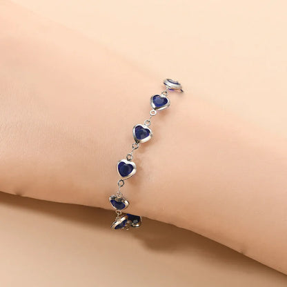 Devil's eye geometric heart bracelet in stainless steel showing colourful electroplated finish options.