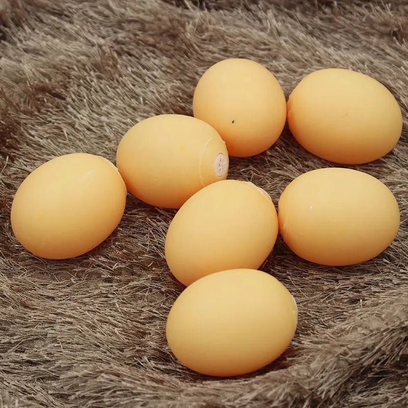 Durable rubber dog chew toy shaped like an egg with sound simulation for puppy teeth cleaning