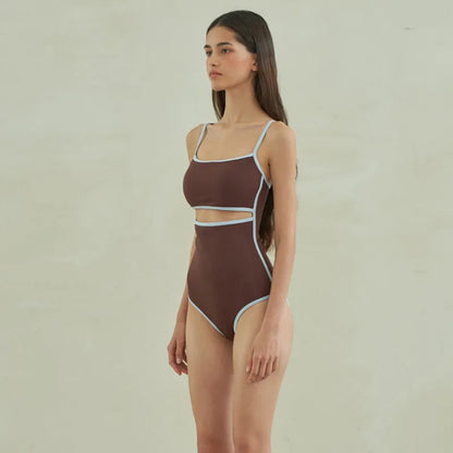 Brown women's one-piece swimsuit with triangle front and adjustable tie-back straps on a neutral background.