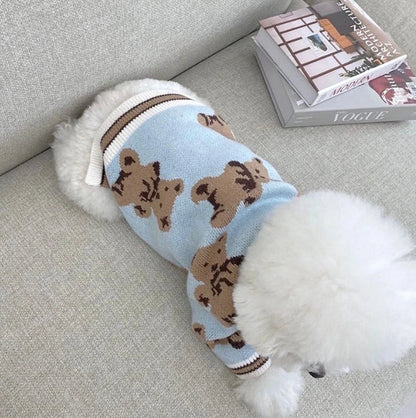 Cosy knitted pet jumper in classic British striped design, available in light blue, beige, and red colours