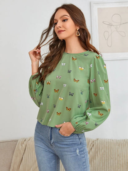 Women's butterfly print long-sleeved shirt in loose fit available in green or orange colours