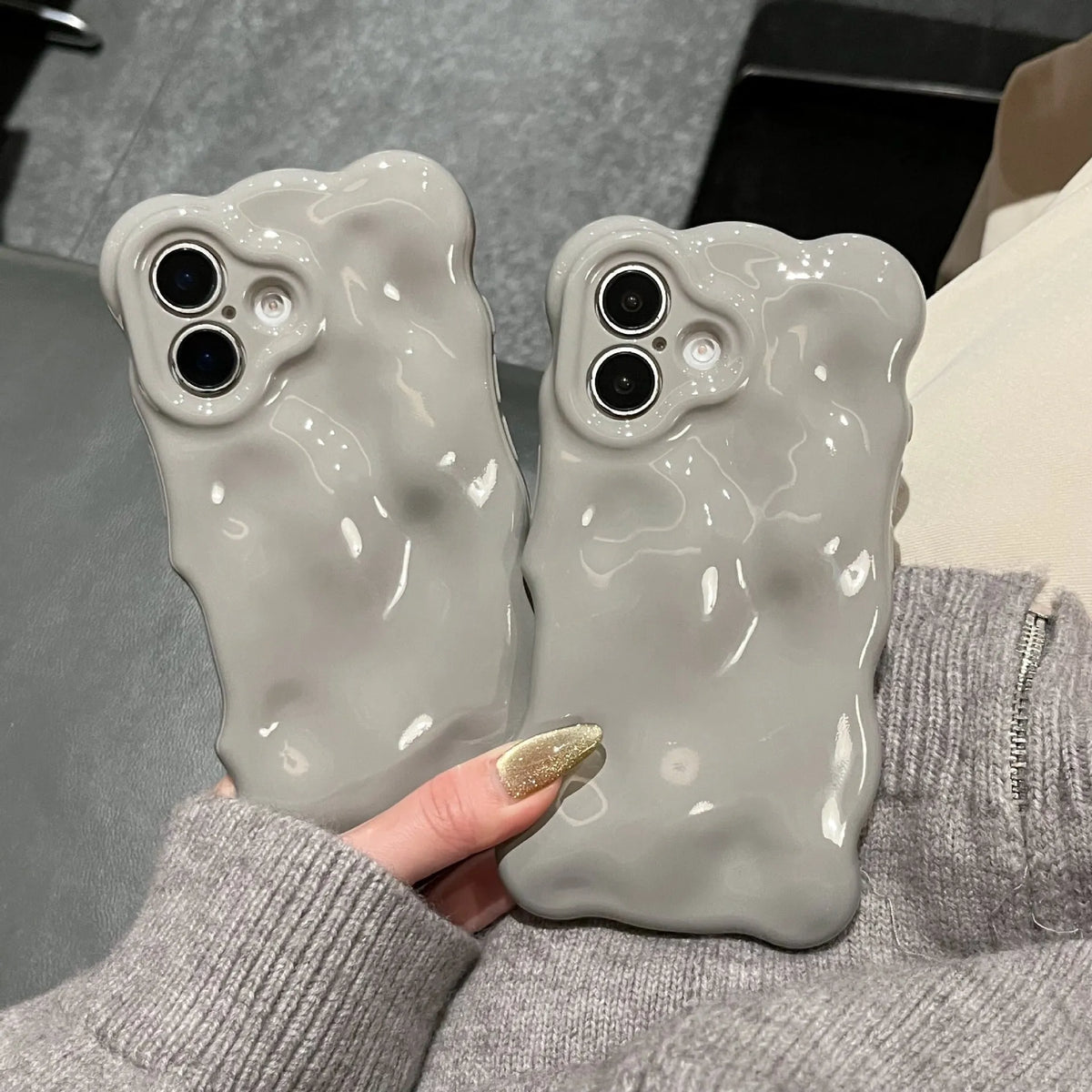 Grey TPU phone case with three-dimensional bubble shell pattern for iPhone 11 to 17 series