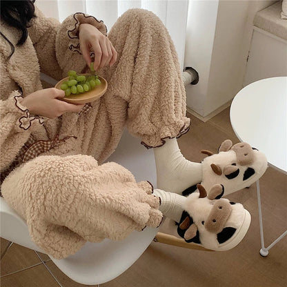 White cow animal slippers with plush faux fur and non-slip PVC soles for women