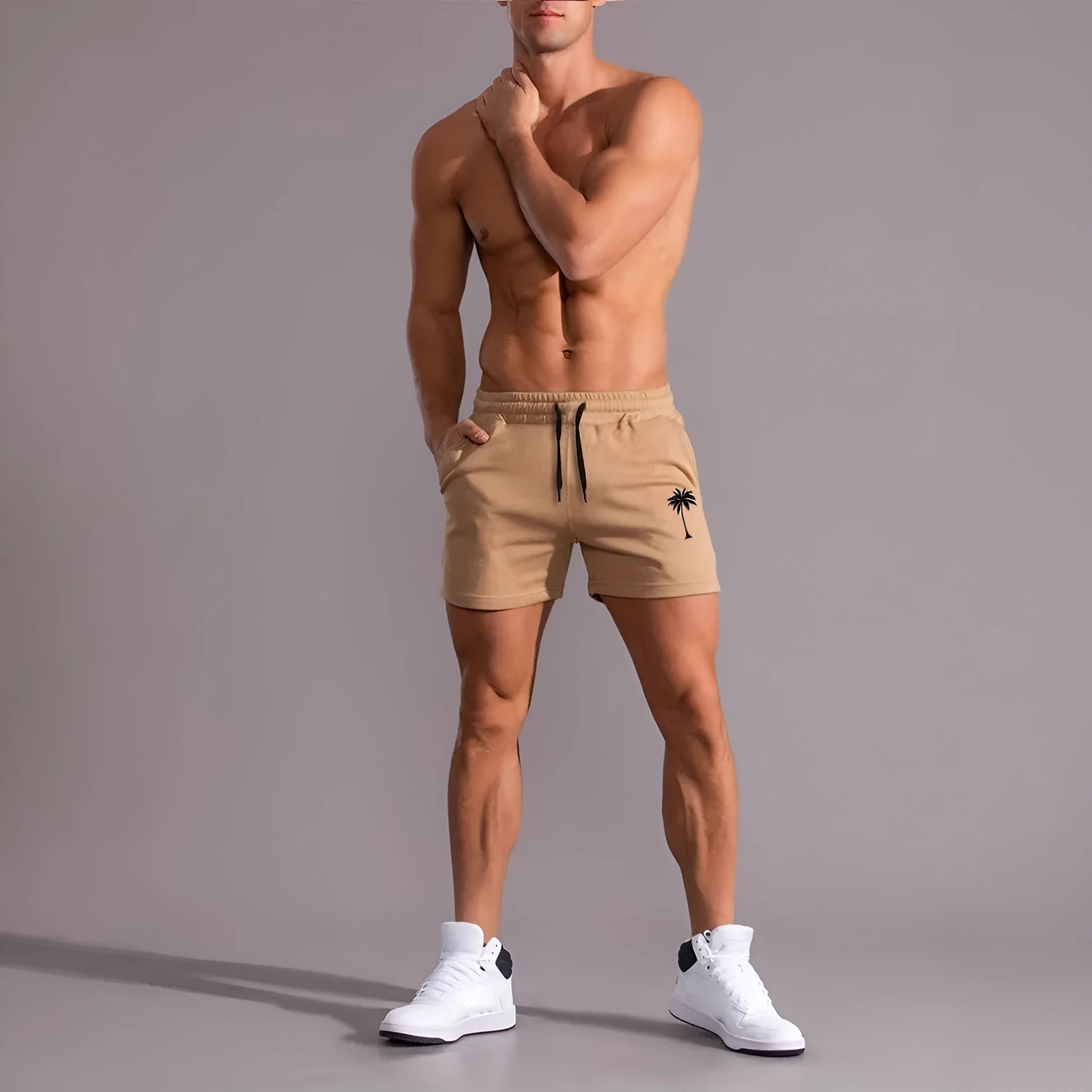 Men's khaki coconut print sports shorts with straight leg and elasticated waistband