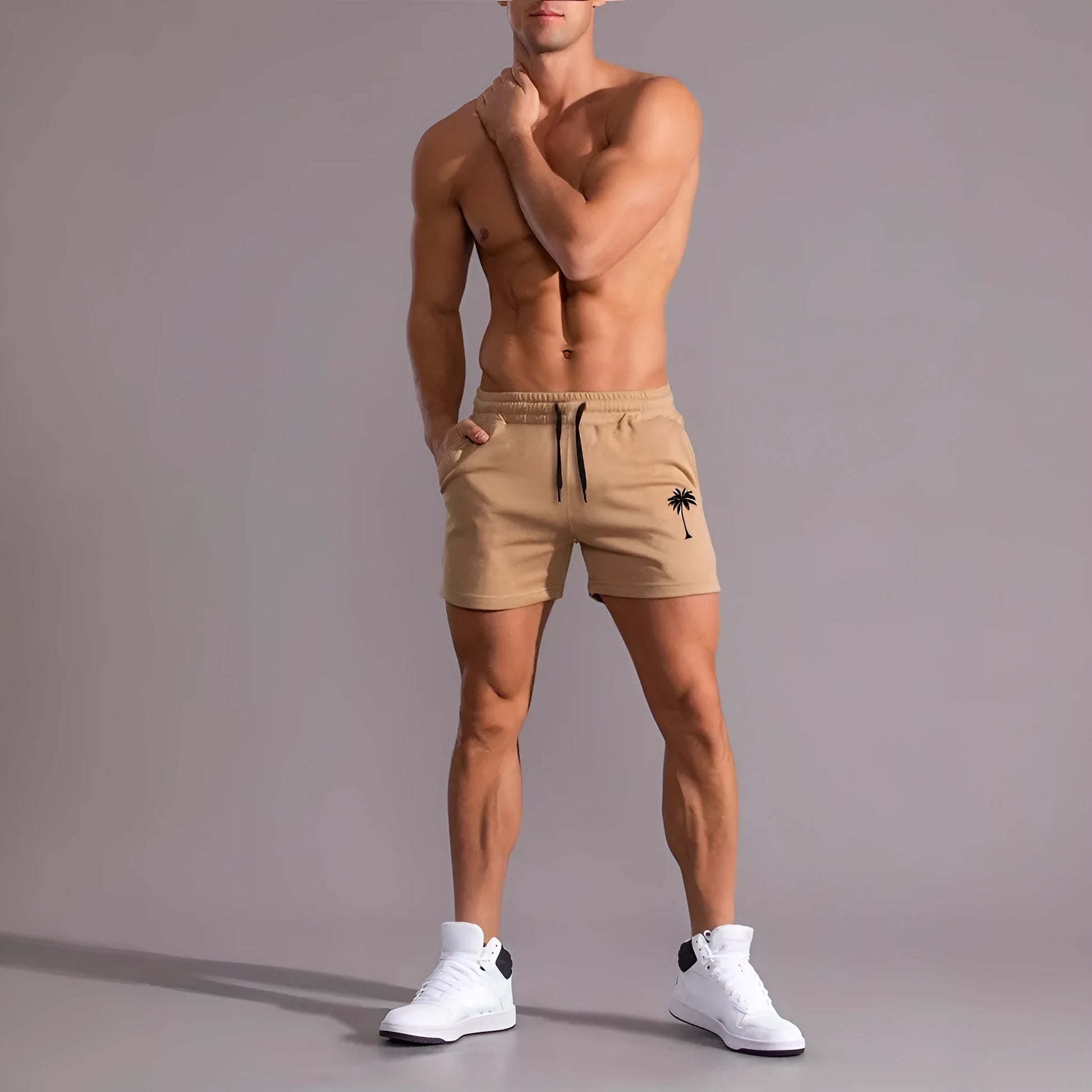 Men's khaki coconut print sports shorts with straight leg and elasticated waistband