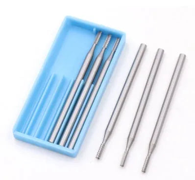 Blue box containing six tungsten steel carving milling cutter grinding heads with thin disc needle shapes and 2.35mm mandrels.