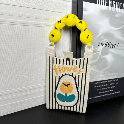 Cartoon knitted messenger bag with polyester construction and internal mobile phone storage