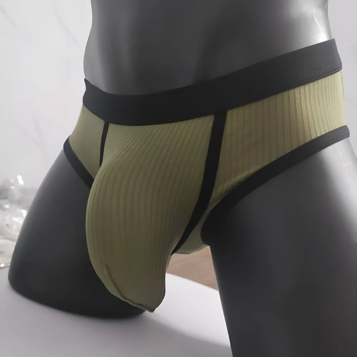 Men's triangle U-shaped bag underwear in viscose fabric showing solid colour options