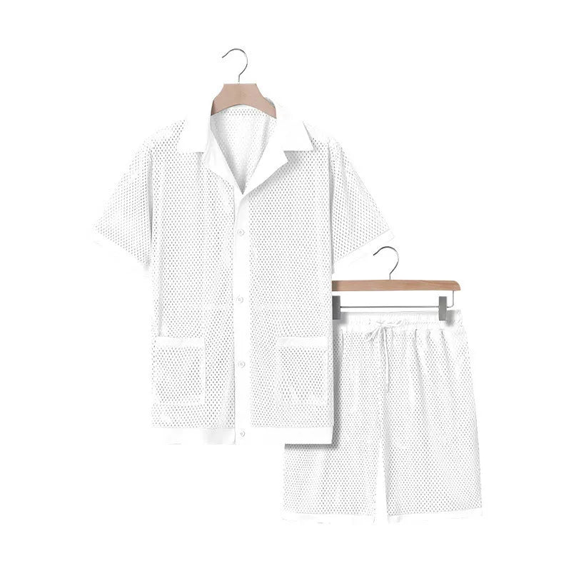 Light blue see-through beach shorts suit with matching cardigan on a summer background.