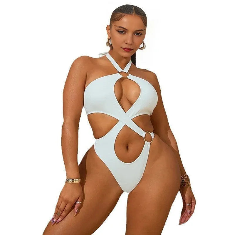 Women's sleeveless jumpsuit with lace-up backless design in polyester with micro-elastic fabric available in black, blue, or white colours with a low-waisted tapered shorts silhouette in sizes S, M, L, and XL for summer casual wear