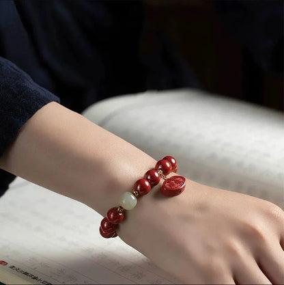 Natural cinnabar emperor sandstone bracelet with Ping An Fu Lu design in 8mm or 10mm size