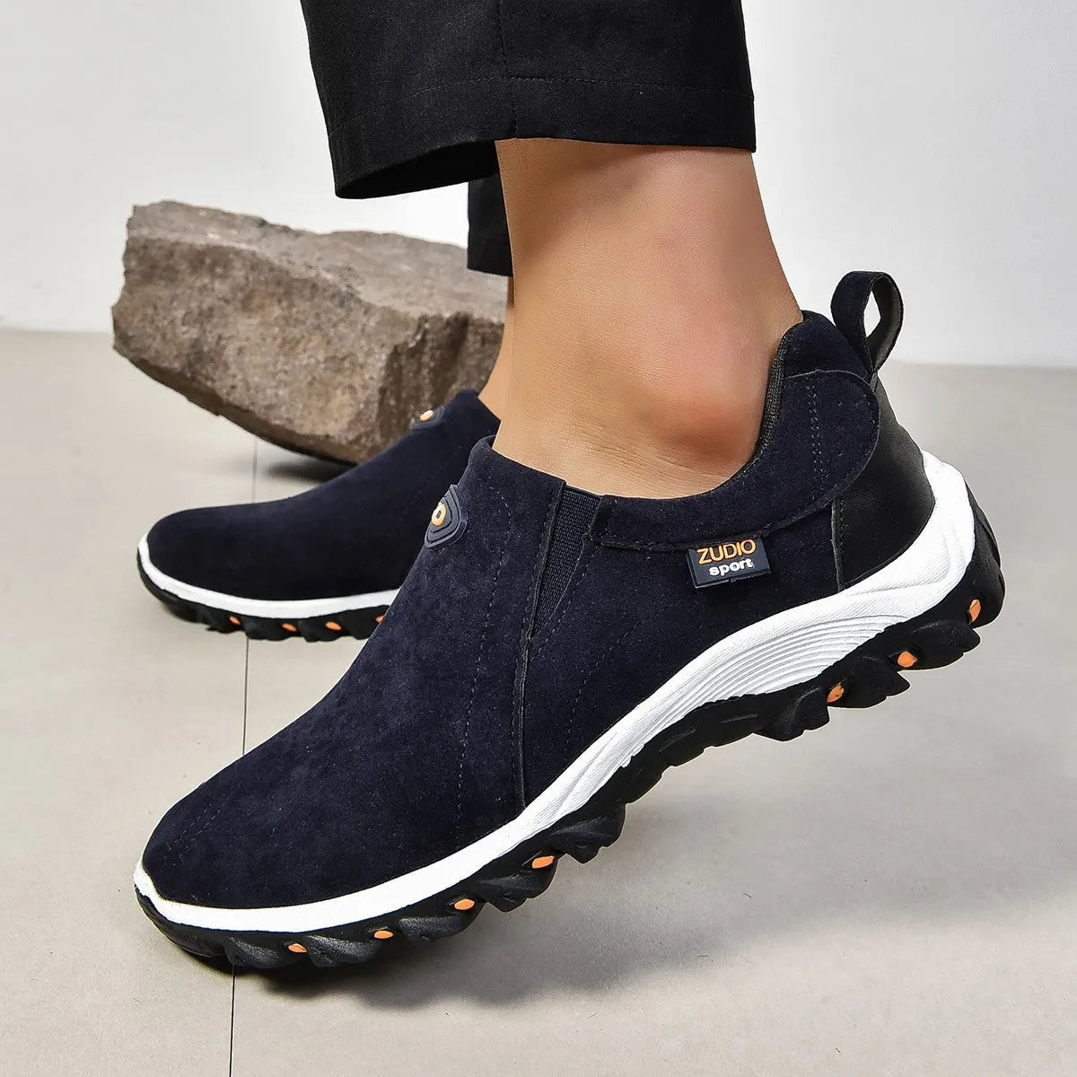 Men's grey round toe slip-on shoes with a shallow mouth on a rubber sole.