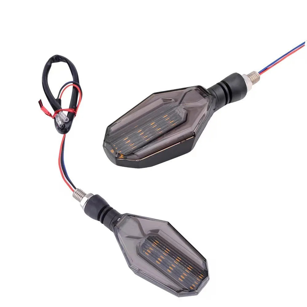 Pair of motorcycle LED indicator signal lights showing the two-colour light guide and 30 LED design.