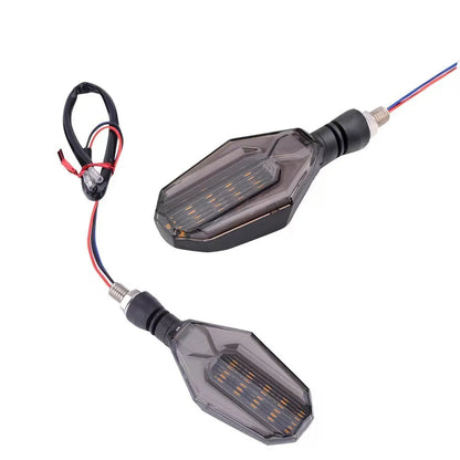 Pair of motorcycle LED indicator signal lights showing the two-colour light guide and 30 LED design.