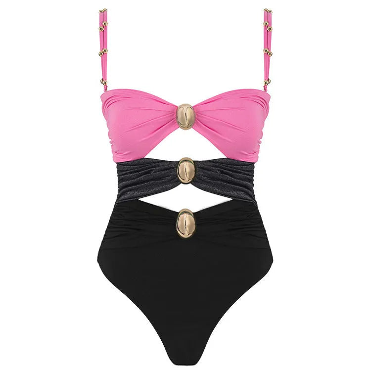Women's one-piece swimsuit with round buckle decoration and hollow-out stitching design in nylon fabric
