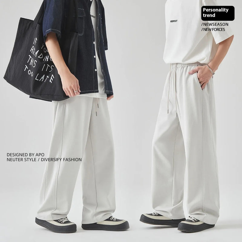 Men's casual summer trousers made from cotton blend fabric with micro elasticity, featuring a high waist design and straight loose fit available in Paris grey and black colours in sizes S to XXL with a lace-up closure