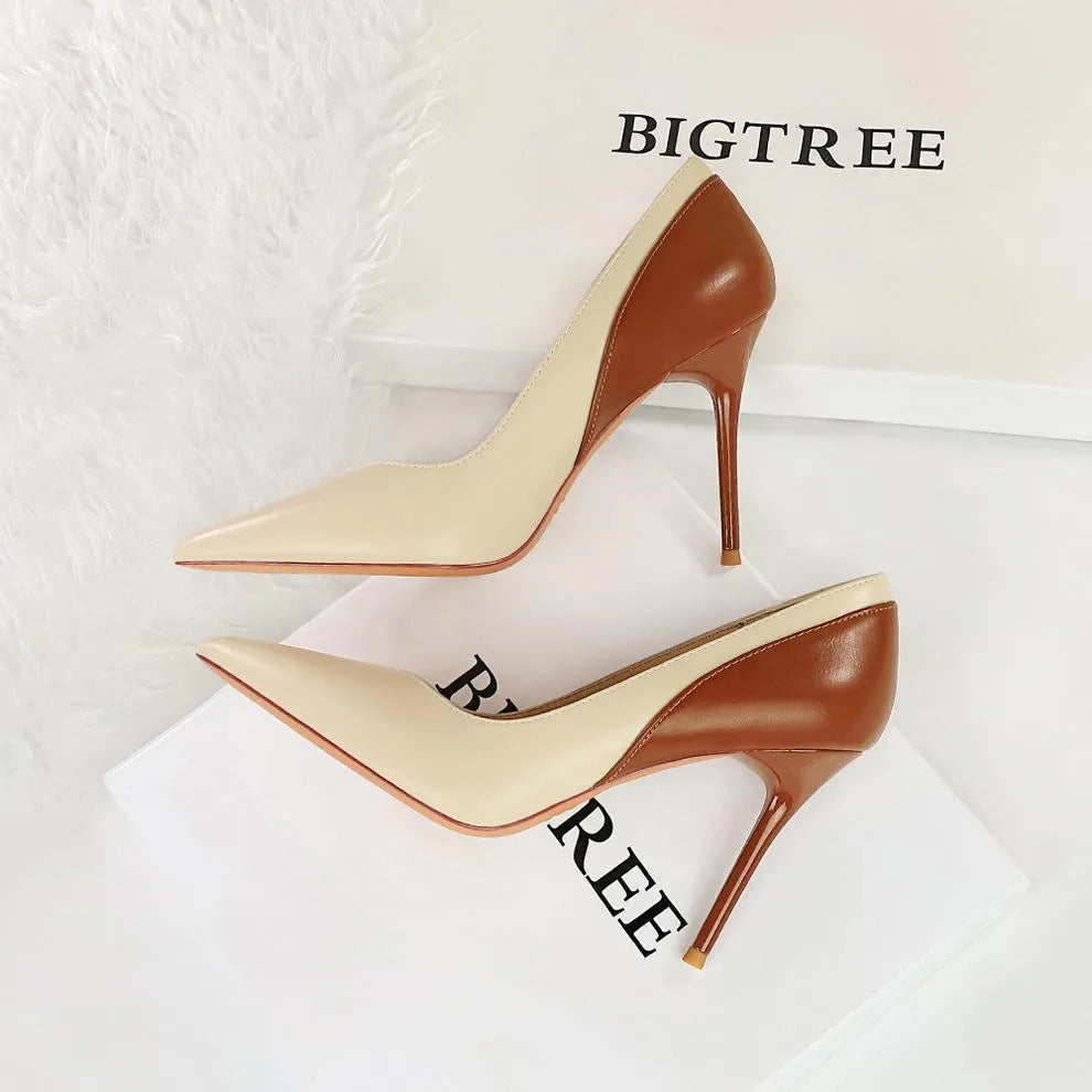 Retro style black stiletto high heels with pointed toe and colour matching pattern