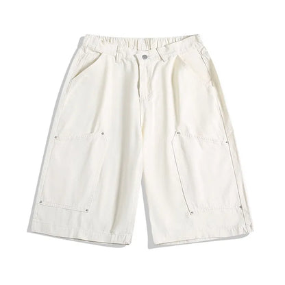 Casual wide-leg cropped pants with workwear rivet detailing in apricot colour with elastic waistband