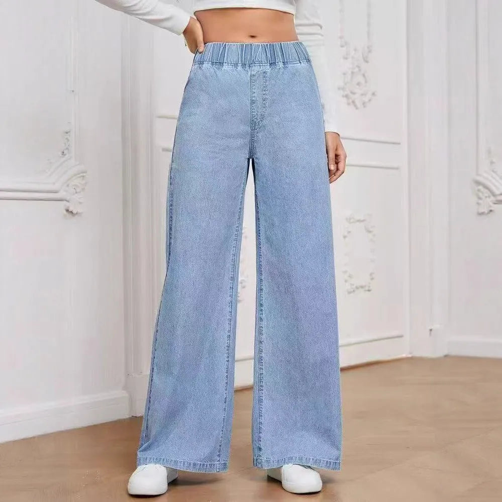 Wide-leg plus size denim trousers in light blue washed colour with straight cut and mid-waist design