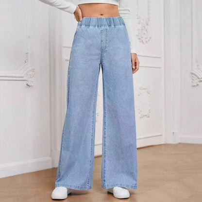 Wide-leg plus size denim trousers in light blue washed colour with straight cut and mid-waist design