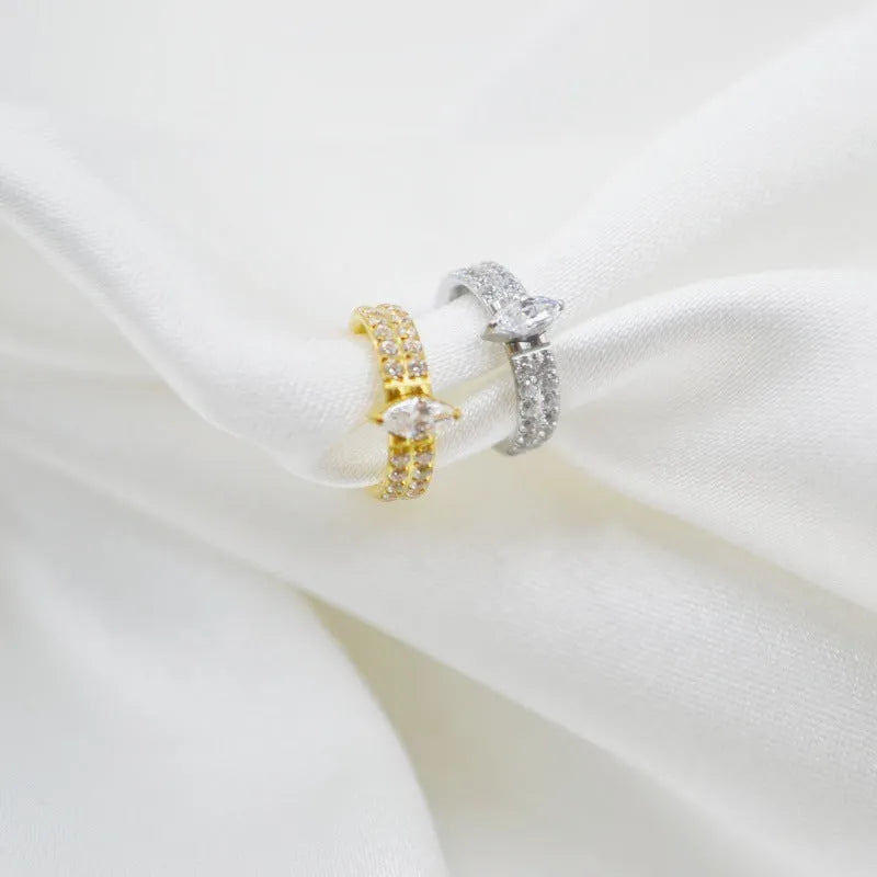 Heart shaped zircon earrings in titanium steel with diamond treatment, available in gold or silver colour options at 1.2x8mm size for ladies fashion jewellery and formal occasion wear.