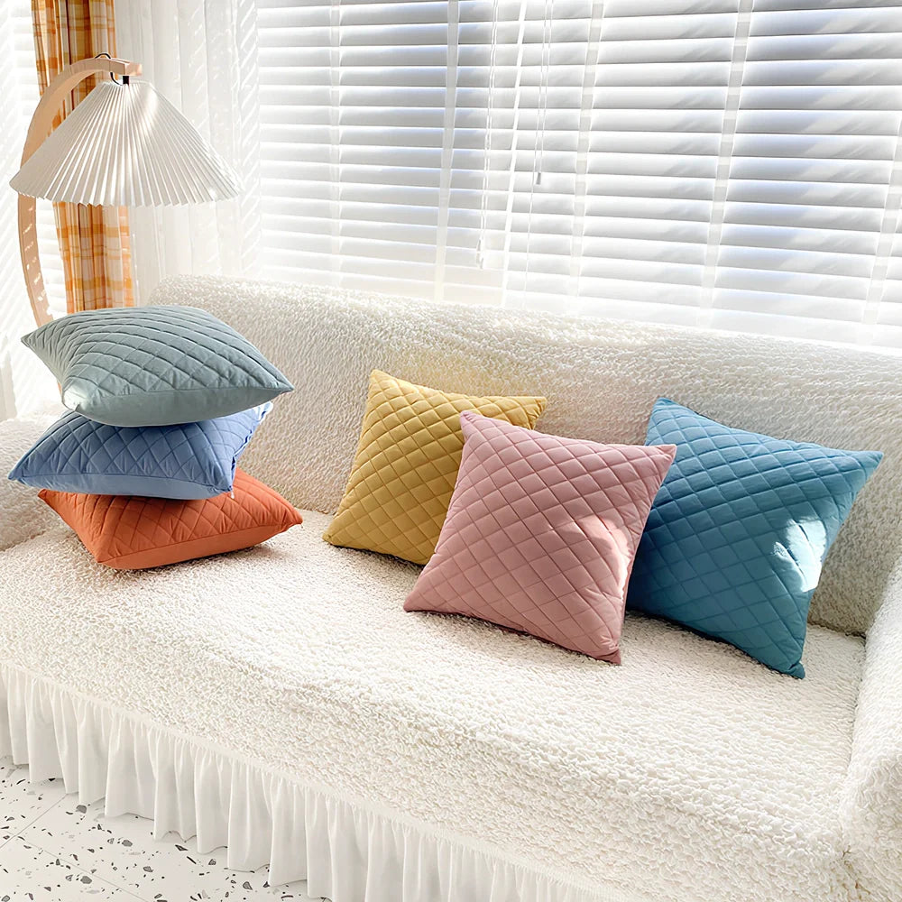 45cm square velvet cushion in Gentleman's Grid colour with PP cotton filler on grey sofa