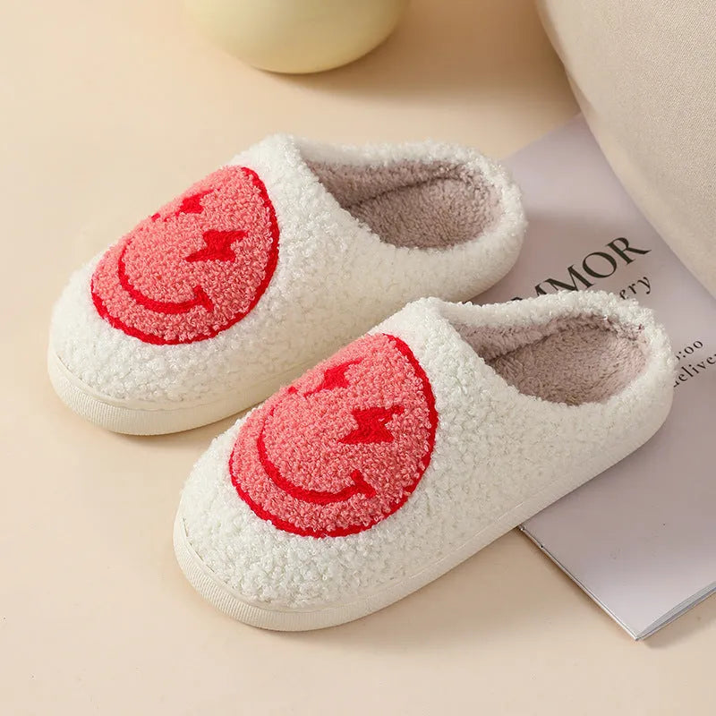 Adult women's plush home slipper in a cartoon love design with a round toe and non-slip PVC sole.