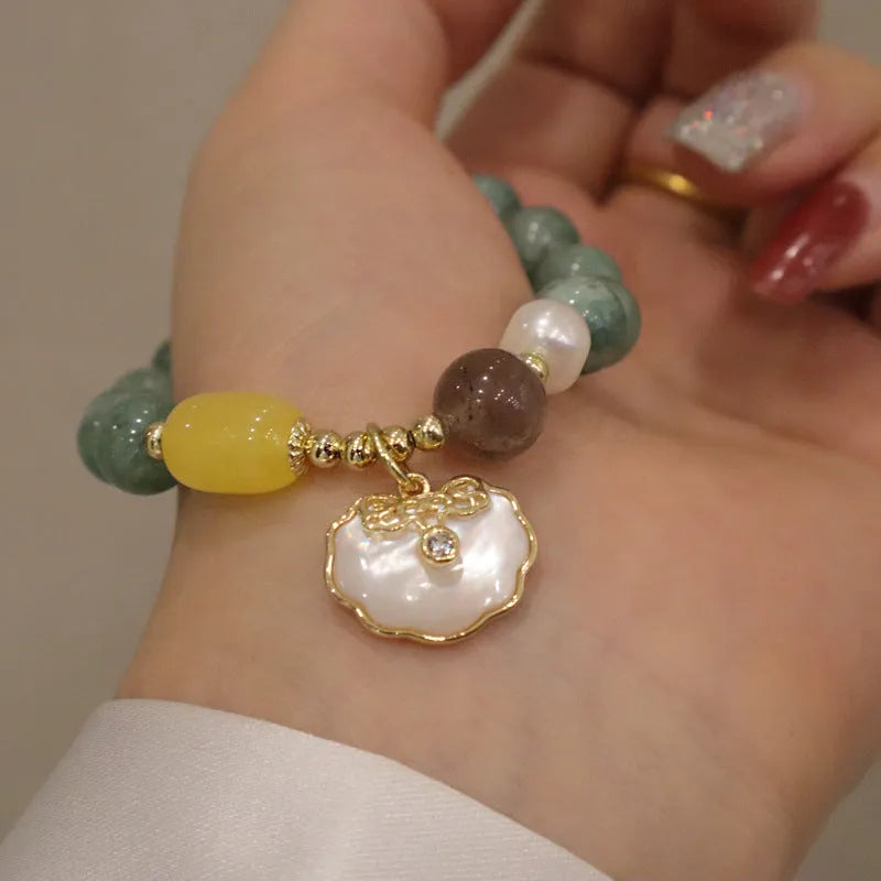 Natural Green Jade Shell Bracelet for women, casual style jewellery accessory with detailed shell charm and adjustable clasp, 7-8 inch wrist fitting, light green gemstone beaded wristband