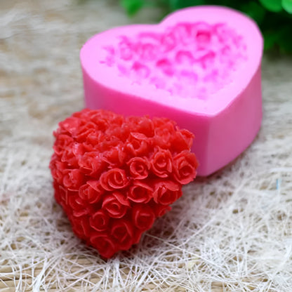 Pink silicone heart-shaped mould with a love design for Valentine's Day crafting.