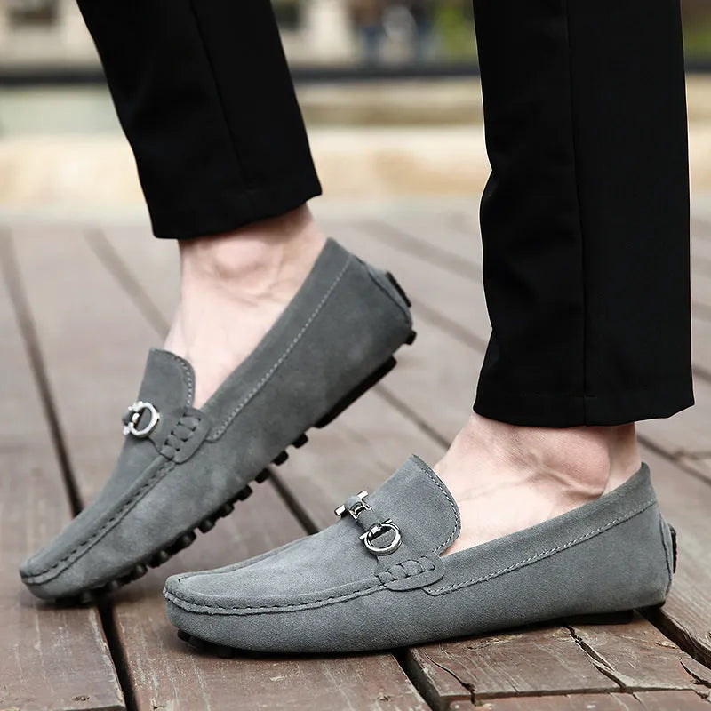 Men's black cowhide slip-on leather shoes with a square toe and flat stiletto heel.