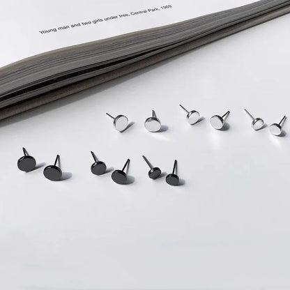 S999 sterling silver round flat bone stud earrings in silver or black, showing size range from 3mm to 8mm.
