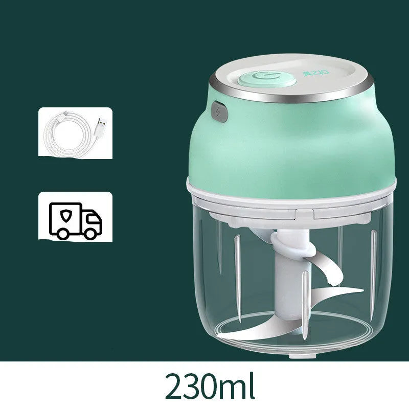 Green portable electric garlic chopper with transparent cup and USB charging cable