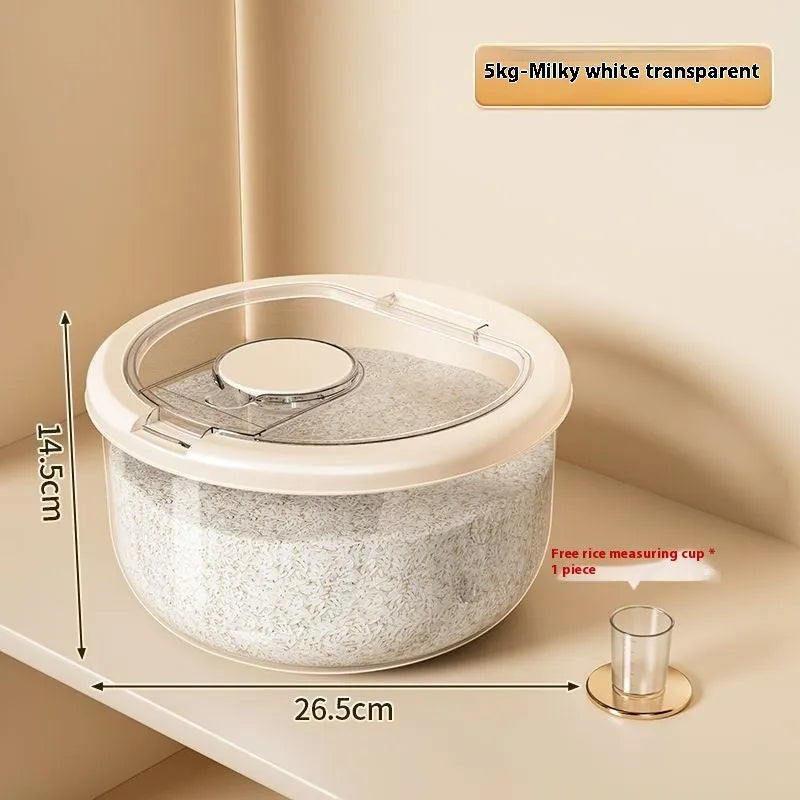 Clear plastic grain storage tank with sealed lid and included rice measuring cup