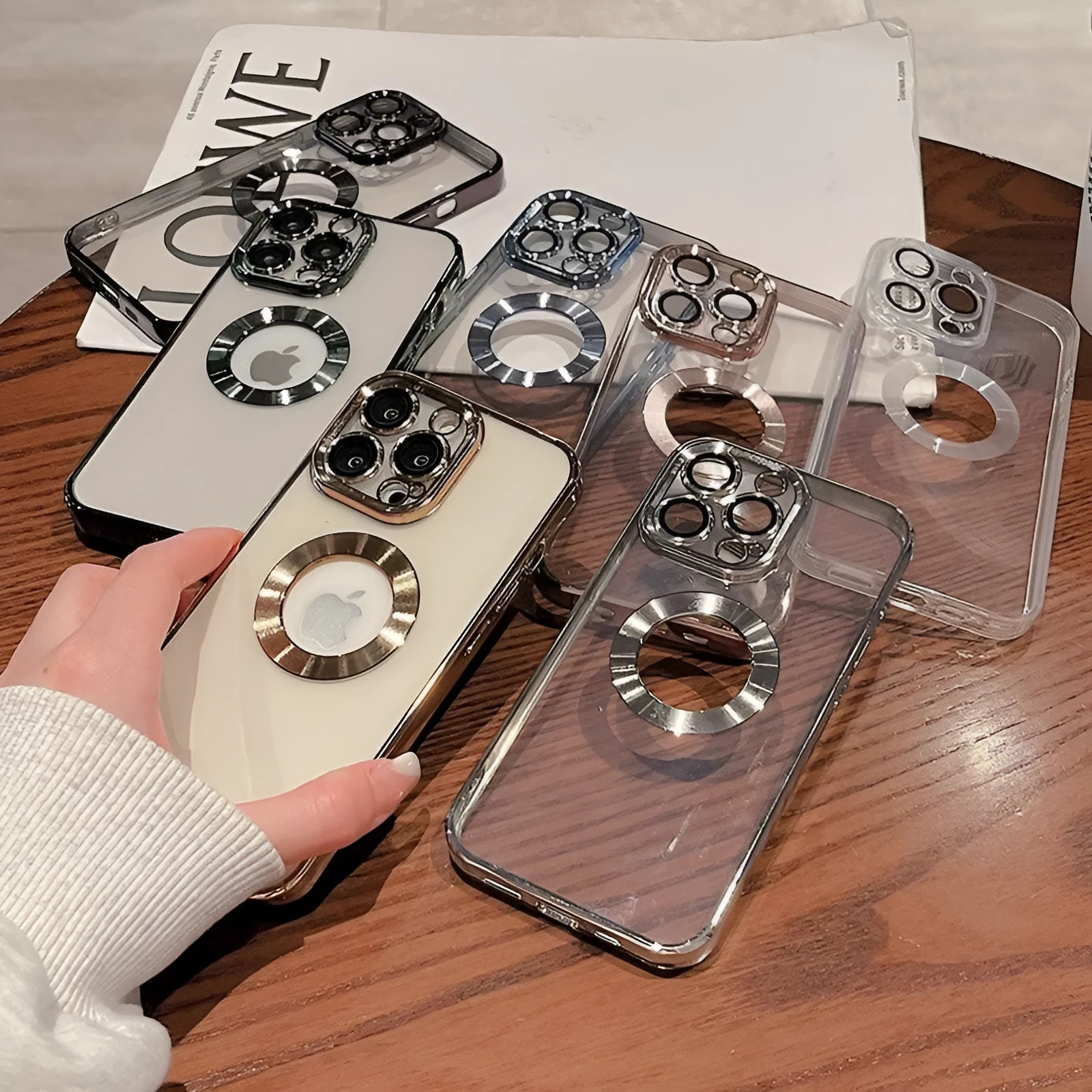 Electroplated silicone iPhone case with built-in camera lens protector shown in Far Peak Blue colour.