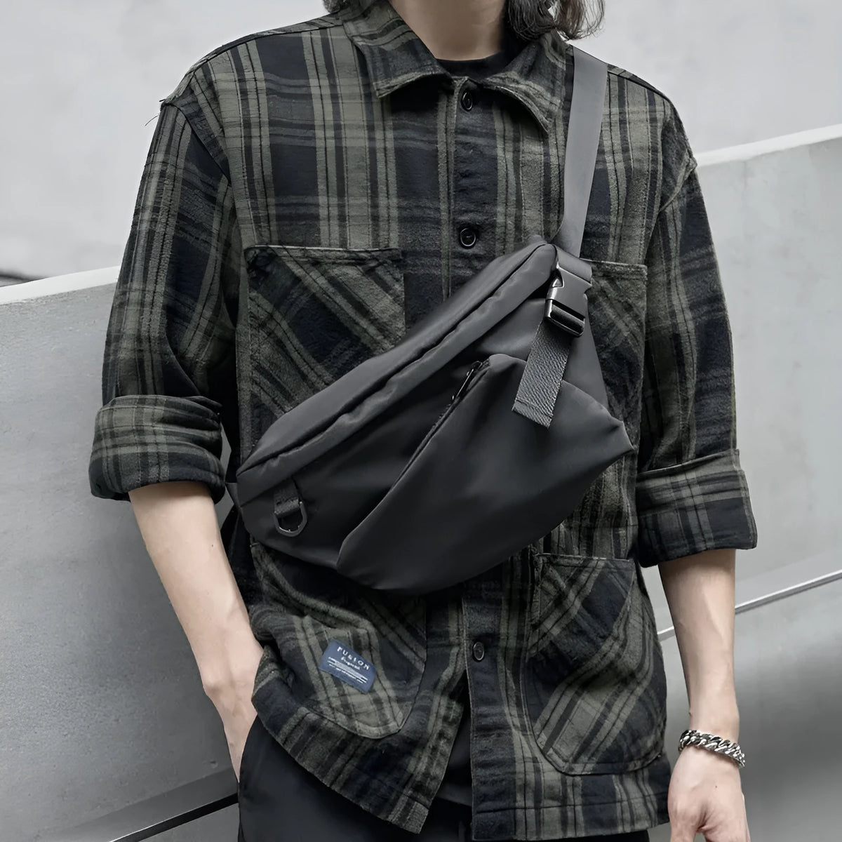 Black men's slanted chest bag with sewing line detailing and 8-inch Oxford fabric construction