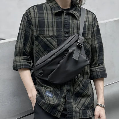 Black men's slanted chest bag with sewing line detailing and 8-inch Oxford fabric construction