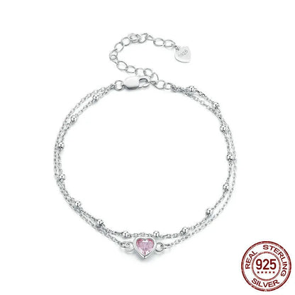 Sweet girlish sterling silver bracelet with a small heart charm on an adjustable chain.