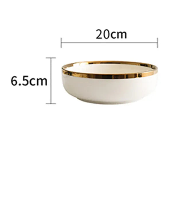 Platinum-coloured porcelain bowl and plate with gold rim, part of a wedding gift tableware set.