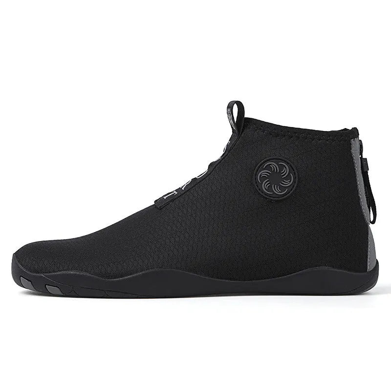 Mid-top outdoor beach shoes in black and fluorescent green with mesh upper and rubber sole.