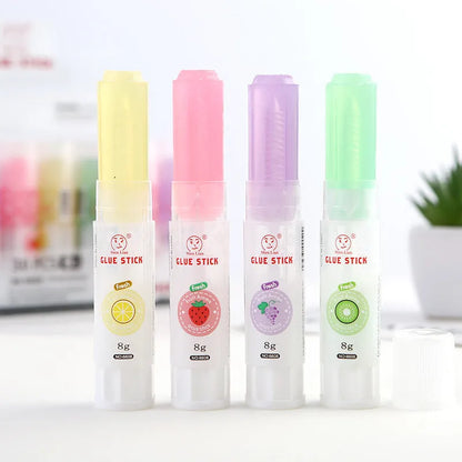 Jelly solid glue stick with fruit scent, 8.5 cm long, for student and craft use.