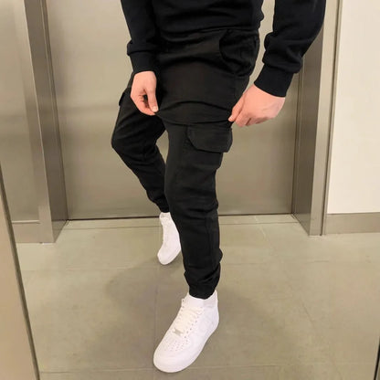Men's loose-fit straight-leg polyester trousers in Army Green with elastic waistband and patch pockets