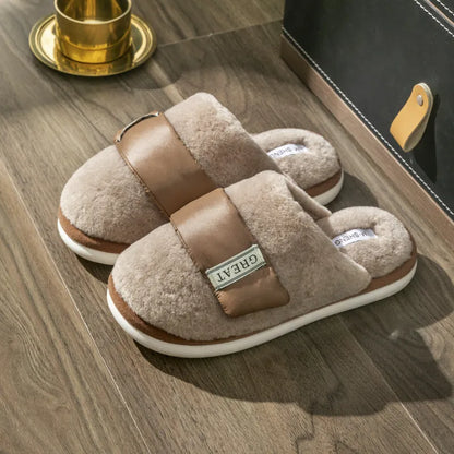 Beige Velcro-fastening plush indoor slippers with round toe and non-slip plastic sole.