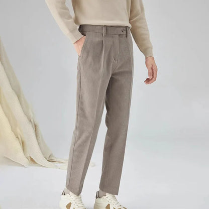 Men's straight-leg corduroy trousers in beige colour showing elastic waistband and loose fit