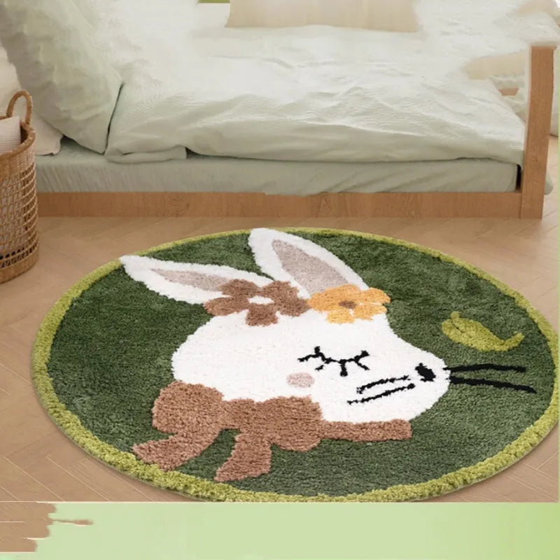 Round soft polyester children's floor carpet in forest green with anti-slip backing, shown beside a bed.