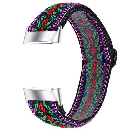 Printed elastic watch strap compatible with Fitbit Charge 6 shown in adjustable position