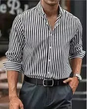 Man modelling a khaki and white striped loose-fit long sleeve casual button shirt.