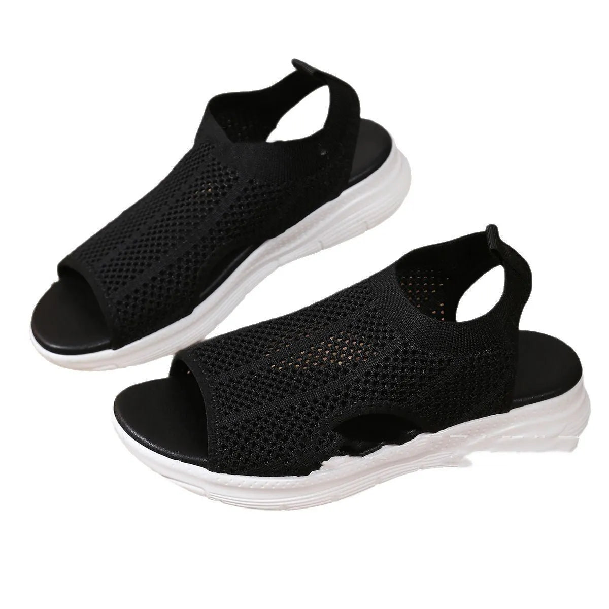 Women's black platform sports sandals with a flat toe and rubber sole on a light background