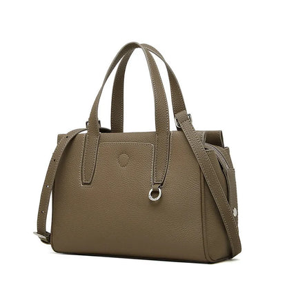 Genuine cowhide leather crossbody bag in a horizontal square shape with a single strap.