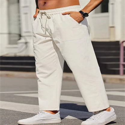 Men's straight-leg linen trousers with an elastic waist in a solid colour