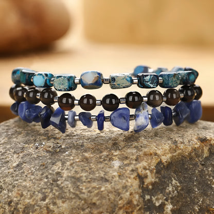 Hand-woven women's bracelet with crushed fang hui stone and gold obsidian geometric beads in multi-layer design